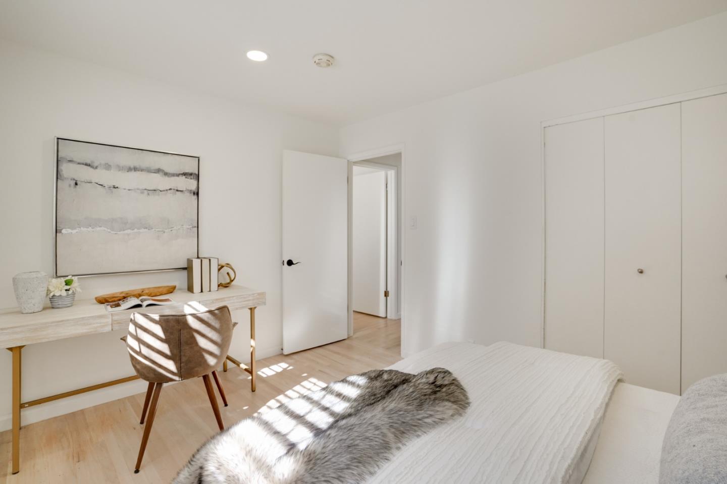 4615 Redding Street Oakland, CA 94619 - Photo 23 of 49 a bedroom with a bed and a chair