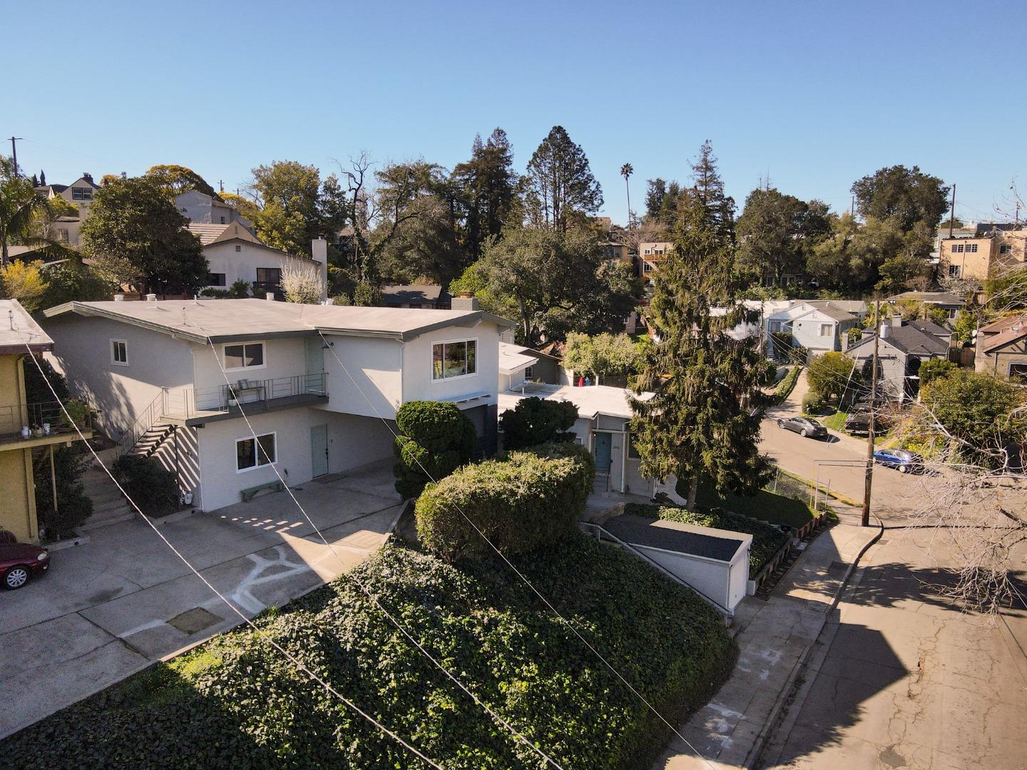 4615 Redding Street Oakland, CA 94619 - Photo 47 of 49 a view of a house with a backyard and a tree