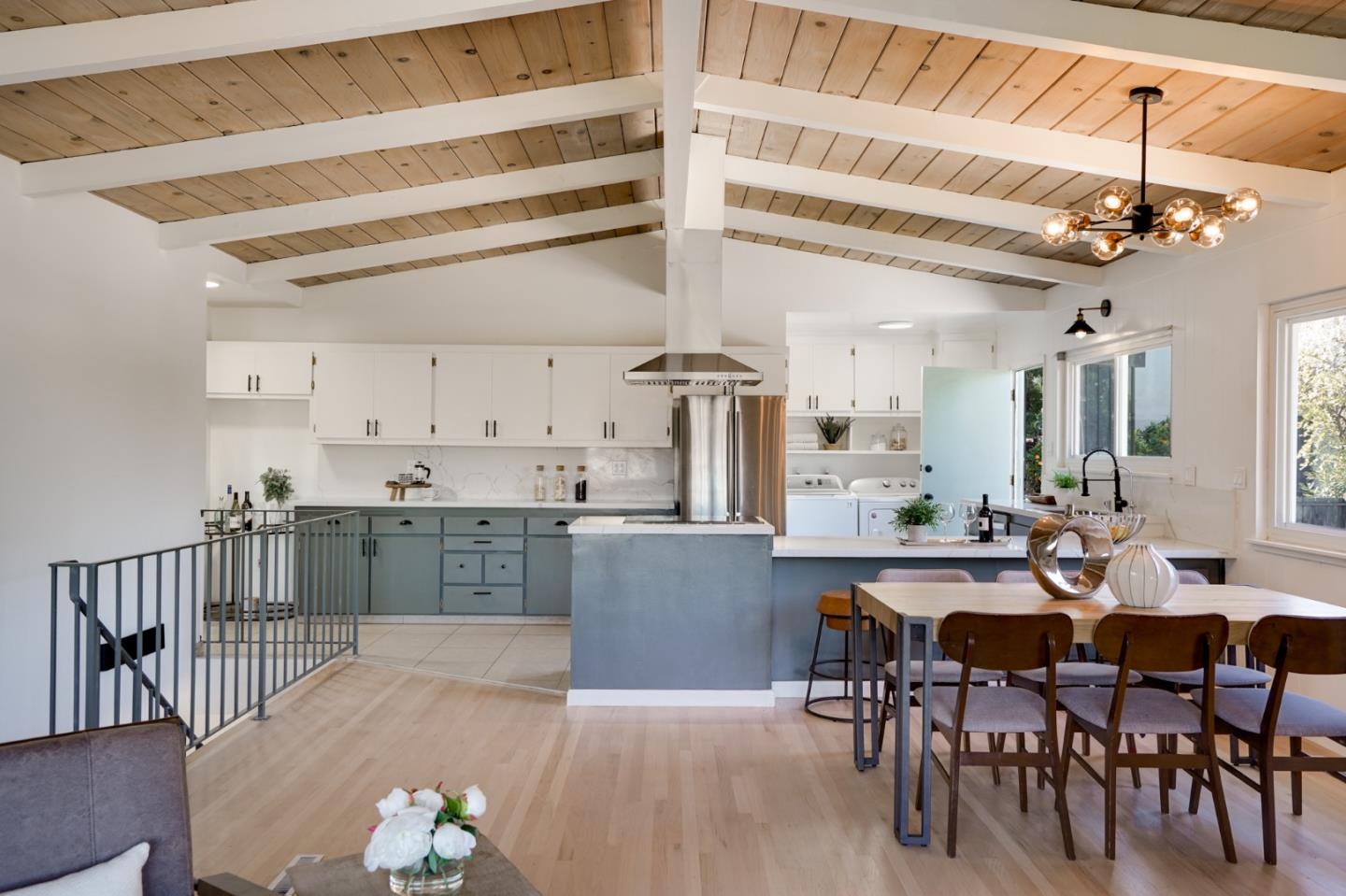 4615 Redding Street Oakland, CA 94619 - Photo 7 of 49 a large kitchen with a table and chairs