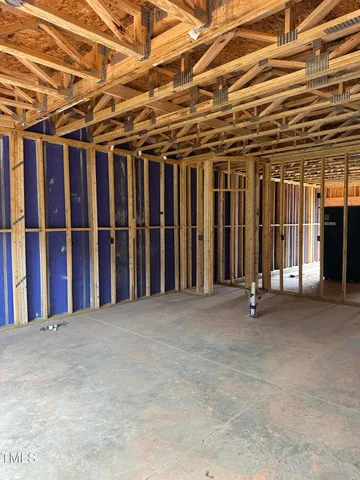 a view of a room with wooden walls