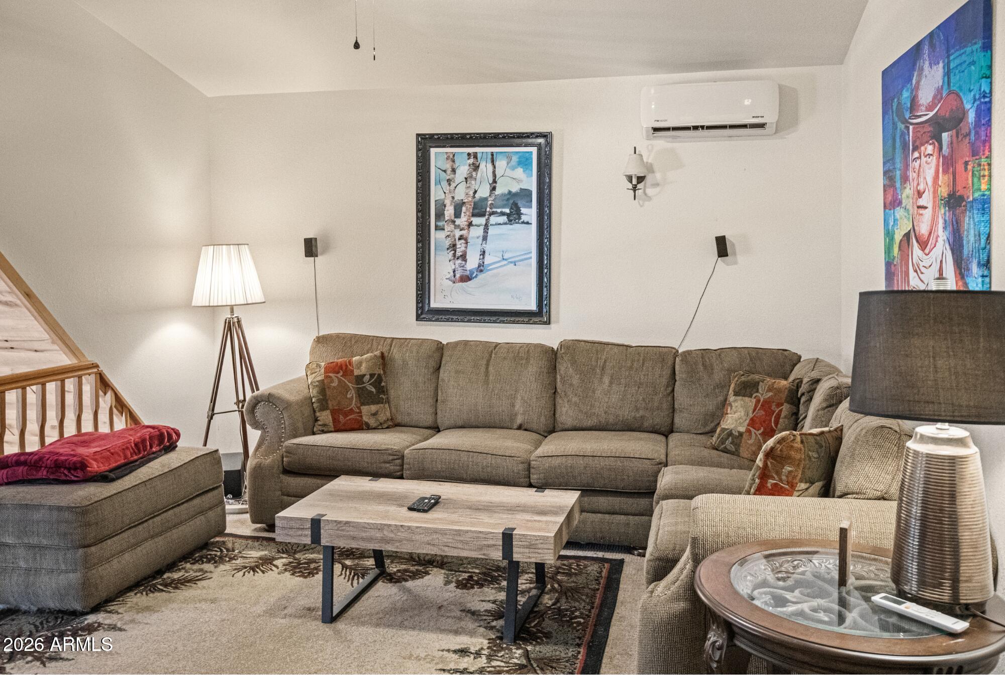 628 Trout Springs Road Forest Lakes, AZ 85931 - Photo 18 of 44 a living room with furniture and a lamp