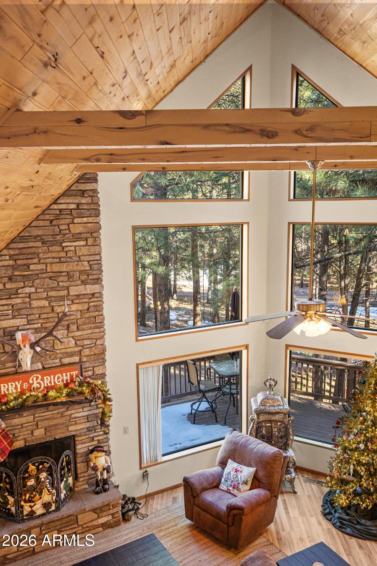 628 Trout Springs Road Forest Lakes, AZ 85931 - Photo 41 of 49 a living room with furniture and a fireplace