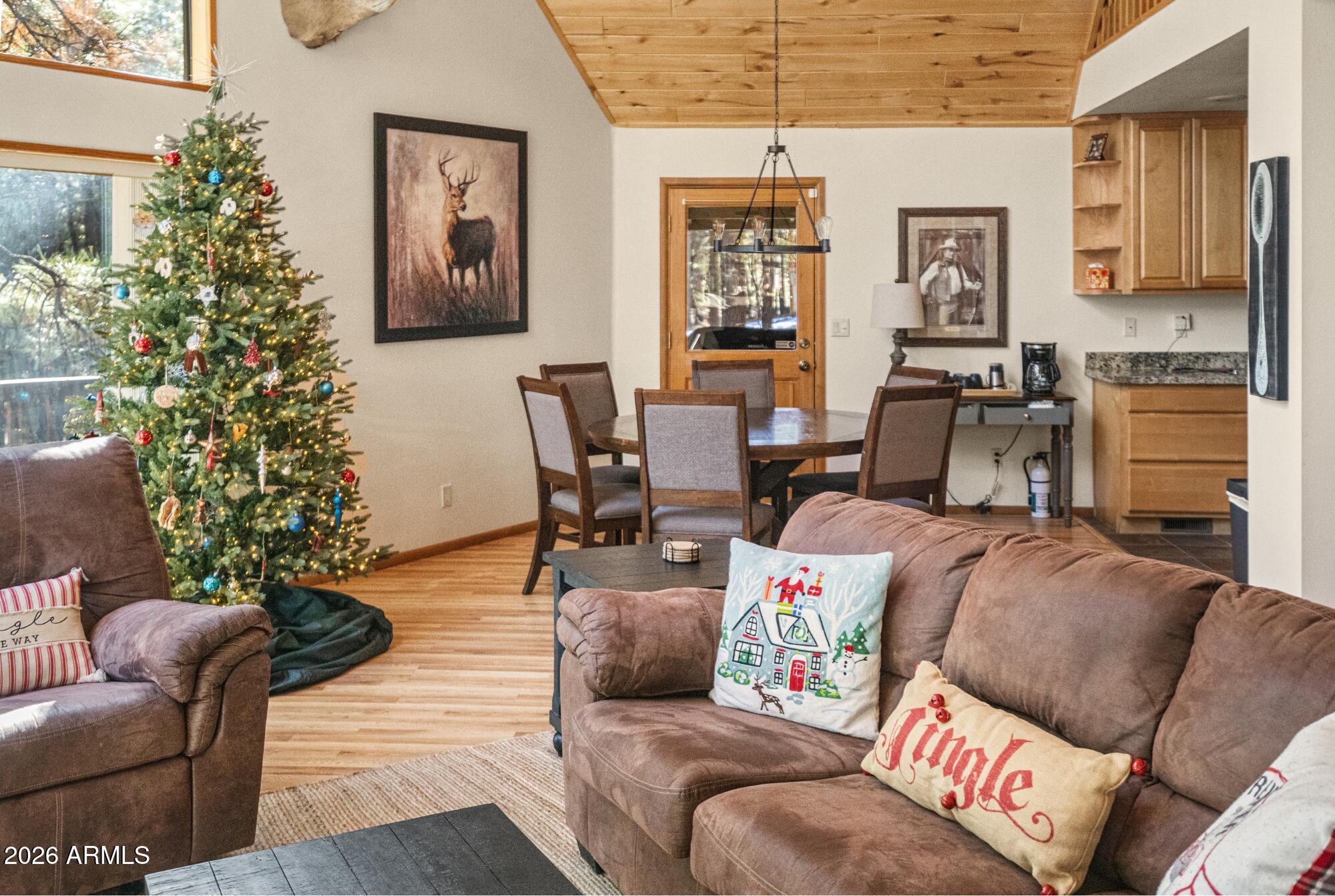 628 Trout Springs Road Forest Lakes, AZ 85931 - Photo 41 of 44 a living room with furniture and a potted plant