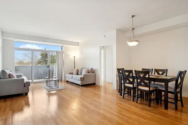 a view of a livingroom with furniture and wooden floor