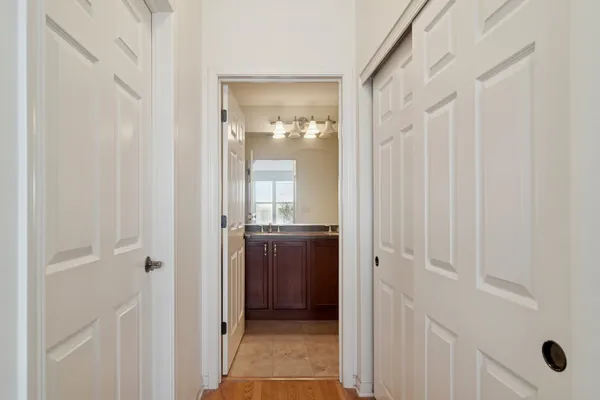 a bathroom with a glass shower door