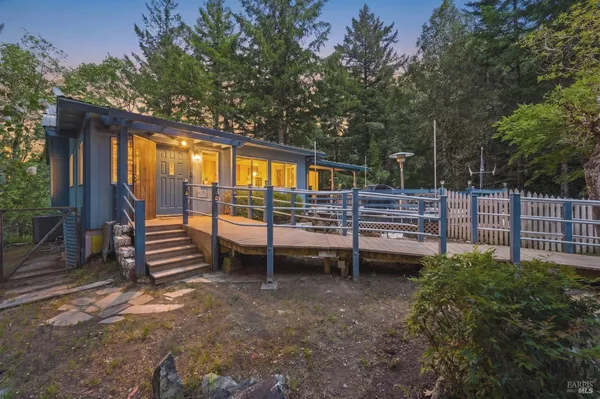 a view of outdoor space with deck and garden