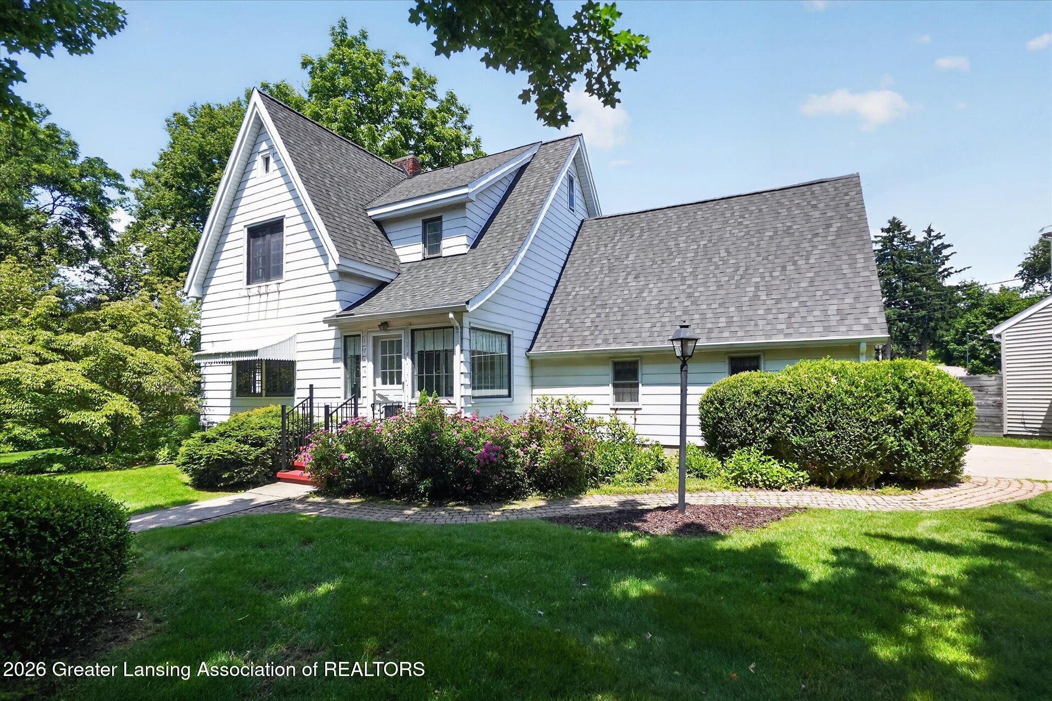1716 Tecumseh River Road Lansing, MI 48906 - Photo 43 of 51 Exterior Front
