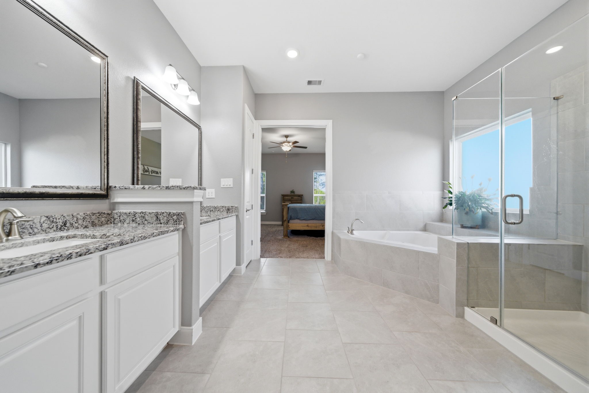 129 Magnolia Reserve Loop Magnolia, TX 77354 - Photo 14 of 34 The primary bathroom