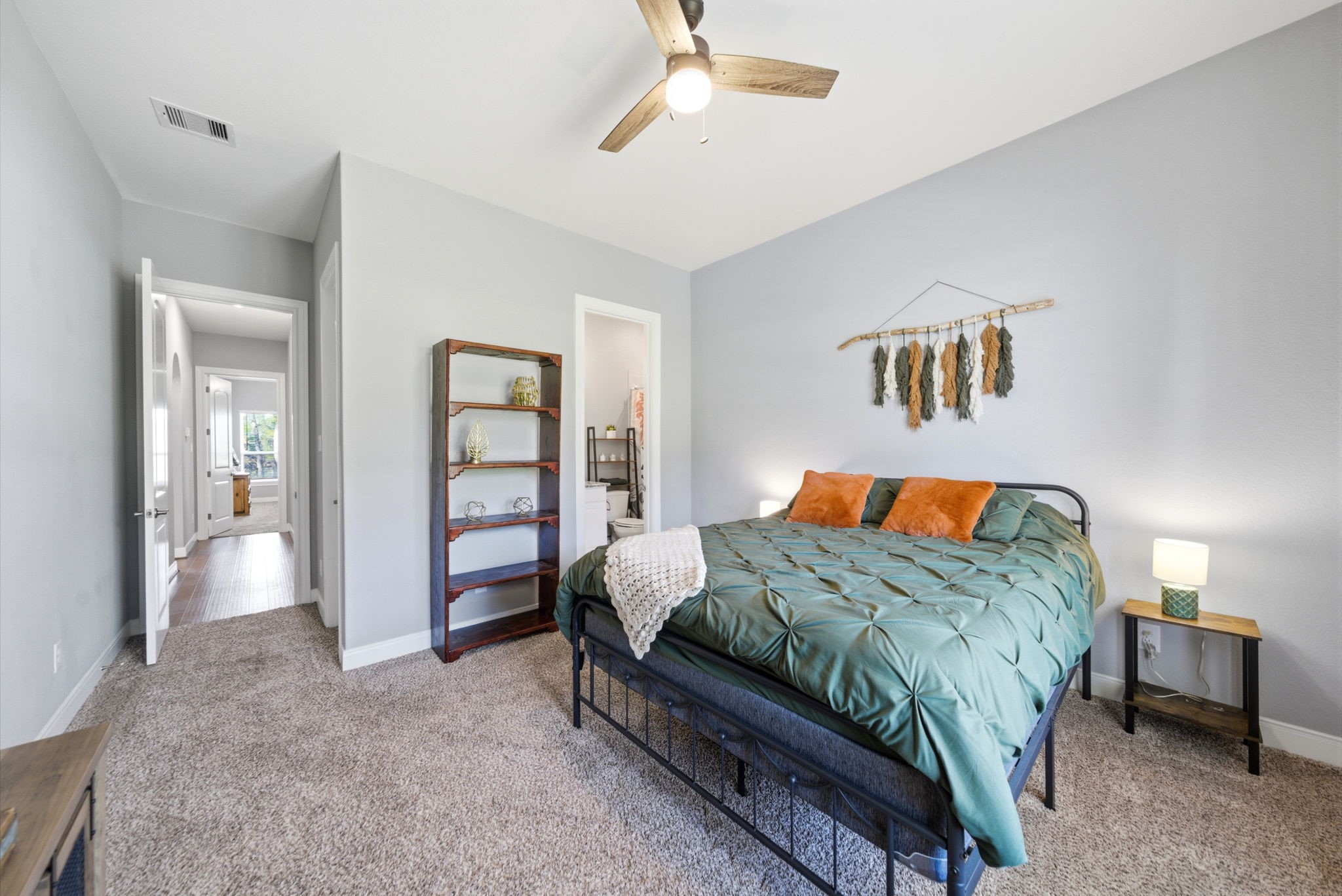 129 Magnolia Reserve Loop Magnolia, TX 77354 - Photo 17 of 34 Bedroom #2 located on the first floor, perfect for guests or young children.