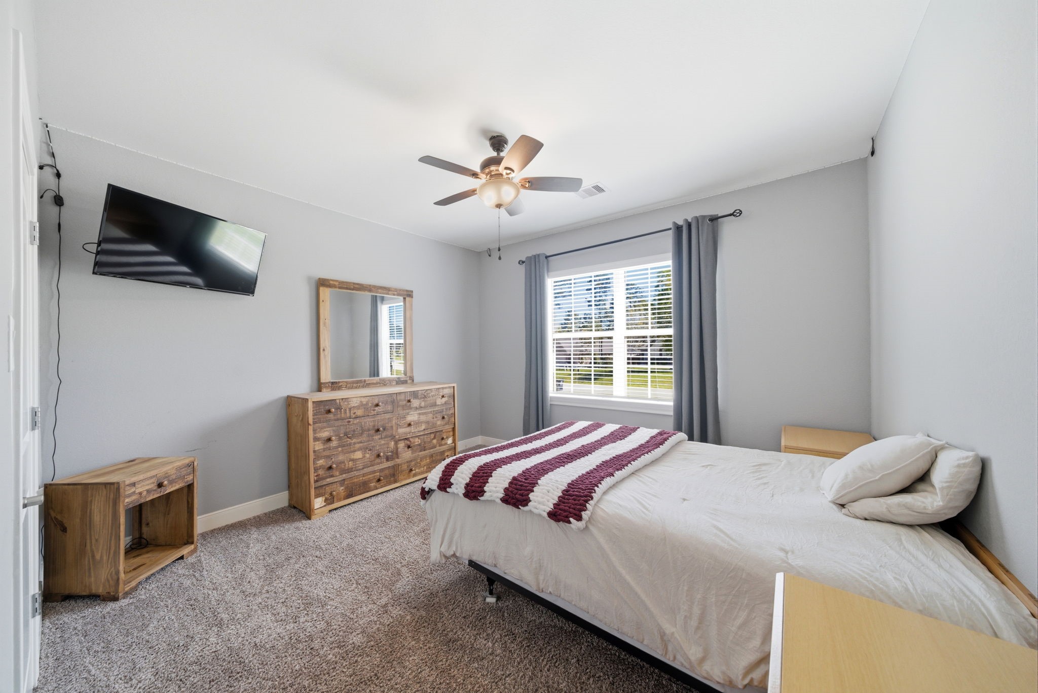 129 Magnolia Reserve Loop Magnolia, TX 77354 - Photo 23 of 34 Bedroom #4 located on the 2nd floor.