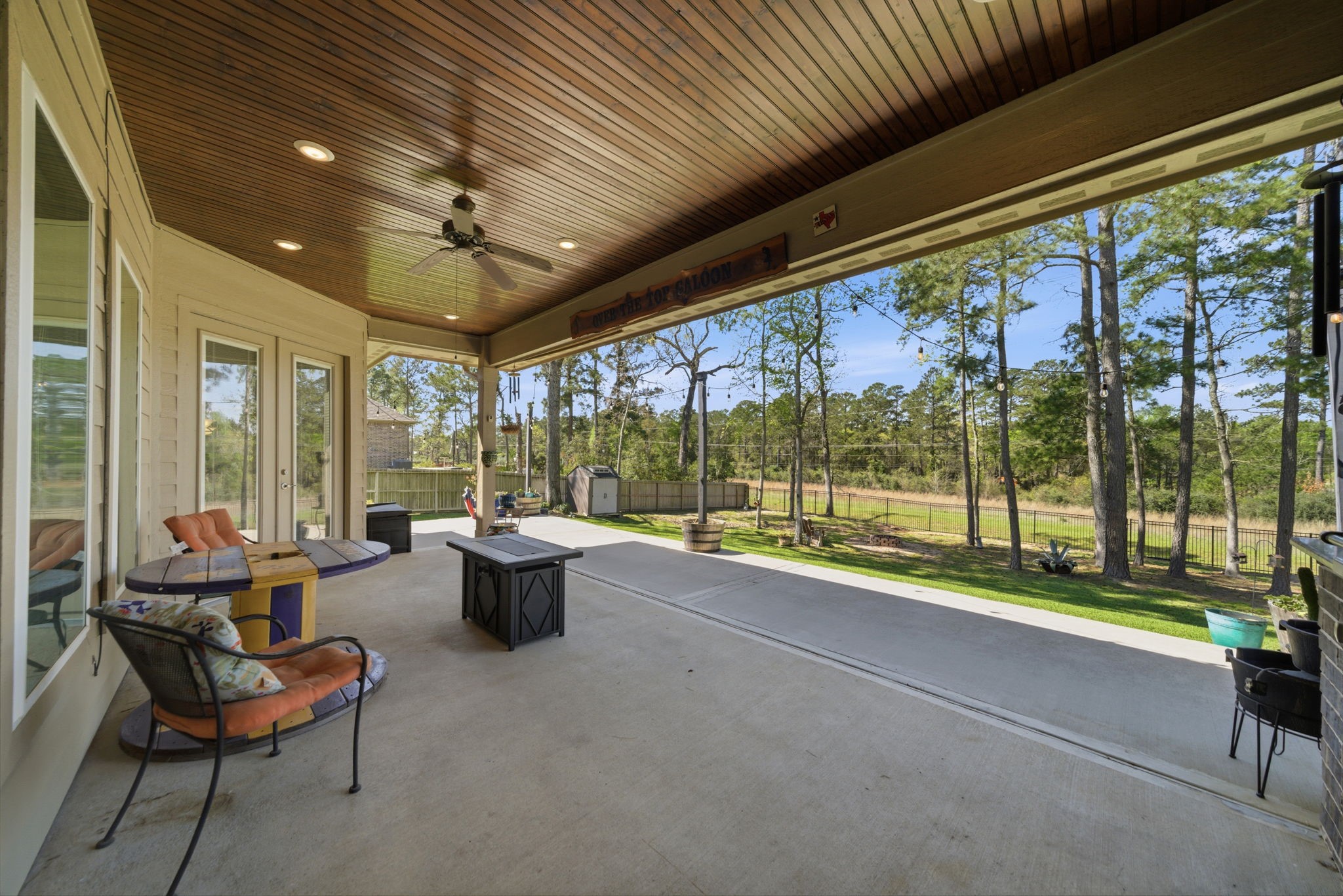 129 Magnolia Reserve Loop Magnolia, TX 77354 - Photo 25 of 34 The back covered porch overlooking your own backyard oasis!