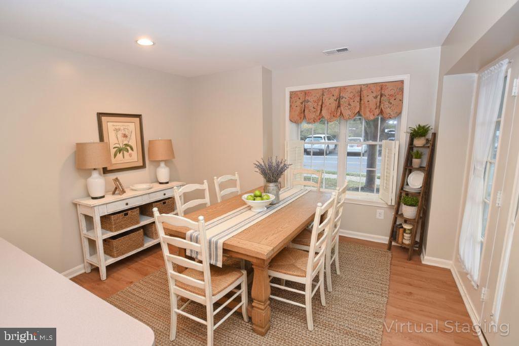 12330 Rosslare Ridge Road, Unit 108 Lutherville-Timonium, MD 21093 - Photo 13 of 28 virtually staged photo of breakfast area