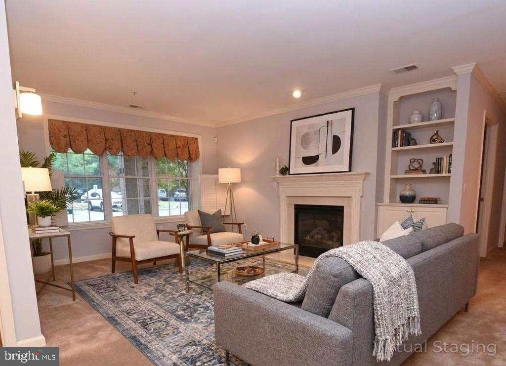 12330 Rosslare Ridge Road, Unit 108 Lutherville-Timonium, MD 21093 - Photo 16 of 28 virtually staged photo of living room