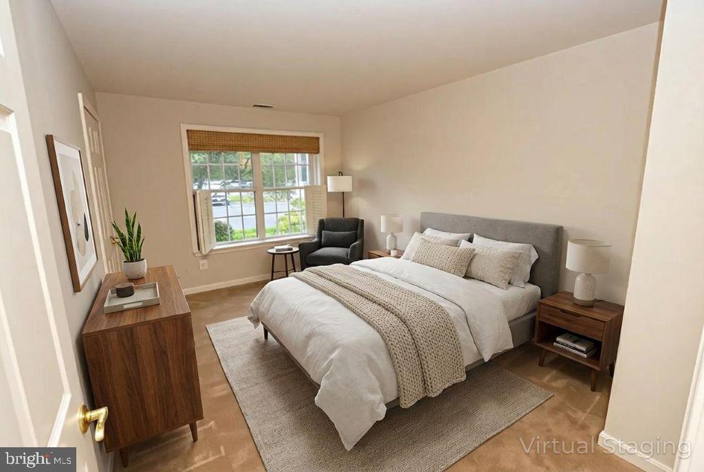 12330 Rosslare Ridge Road, Unit 108 Lutherville-Timonium, MD 21093 - Photo 20 of 28 virtually staged photo of primary bedroom