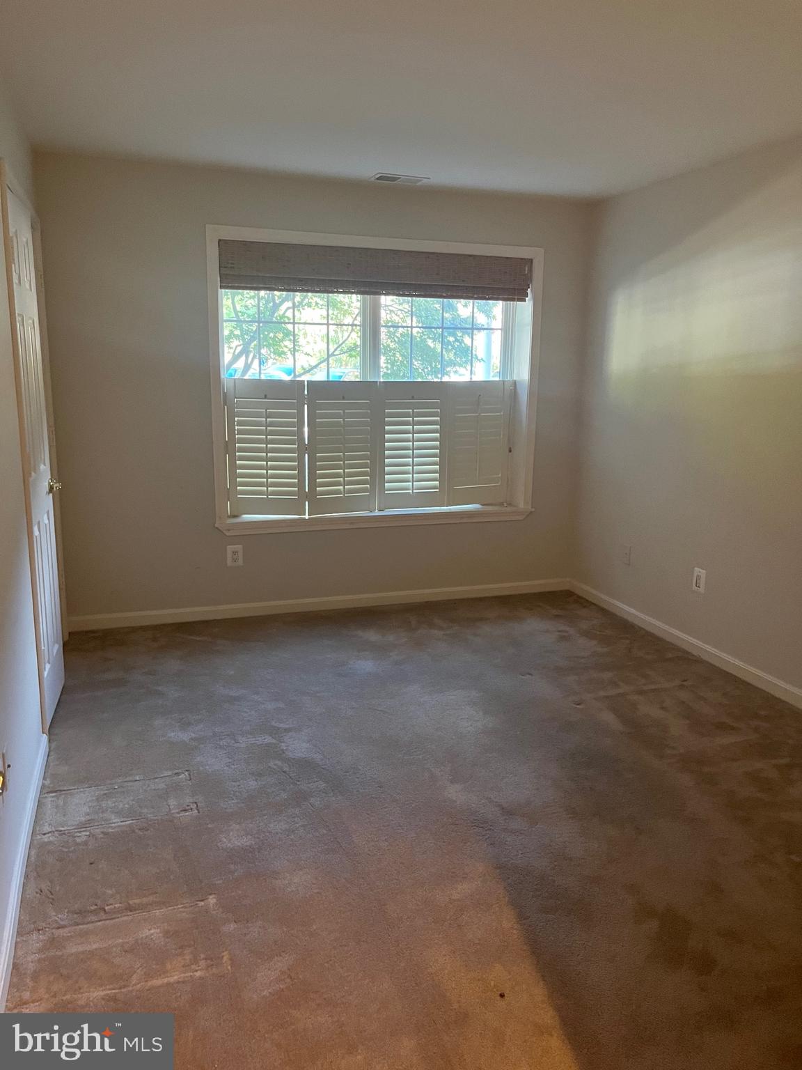 12330 Rosslare Ridge Road, Unit 108 Lutherville-Timonium, MD 21093 - Photo 21 of 23 White shutters on almost all windows