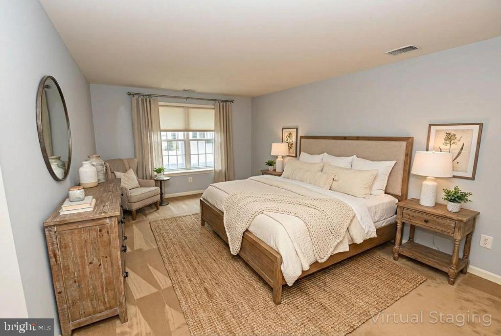 12330 Rosslare Ridge Road, Unit 108 Lutherville-Timonium, MD 21093 - Photo 24 of 28 virtually staged photo of the 2nd bedroom