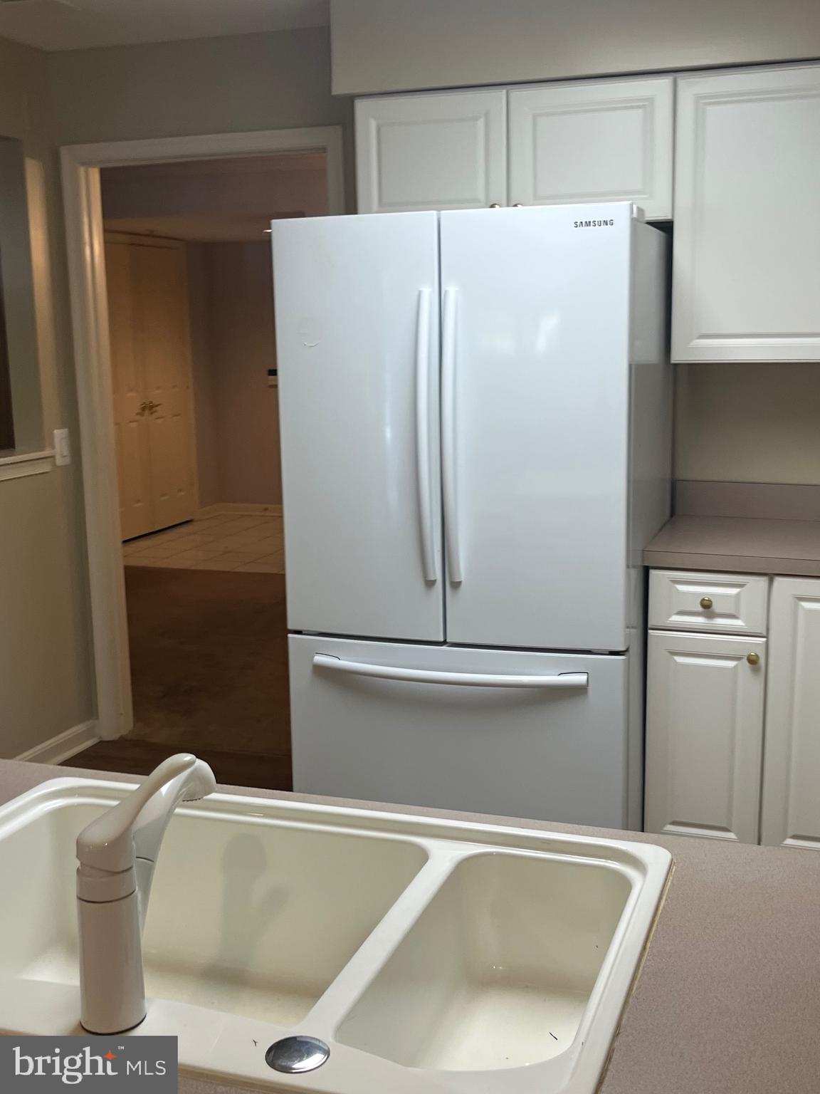 12330 Rosslare Ridge Road, Unit 108 Lutherville-Timonium, MD 21093 - Photo 10 of 23 Double ceramic sink and nearly new refrigerator