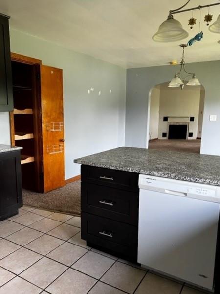 102 Gurney Road Franklin, PA 16323 - Photo 3 of 29 a kitchen with kitchen island granite countertop a refrigerator and a sink