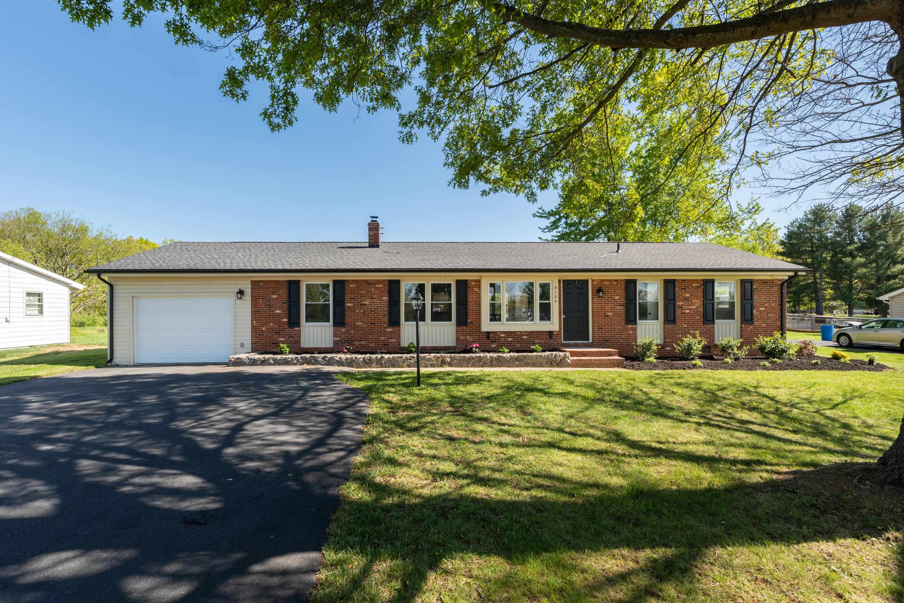 3124 Lyndhurst Road Stuarts Draft, VA 24477 - Photo 1 of 37 a front view of a house with swimming pool having outdoor seating