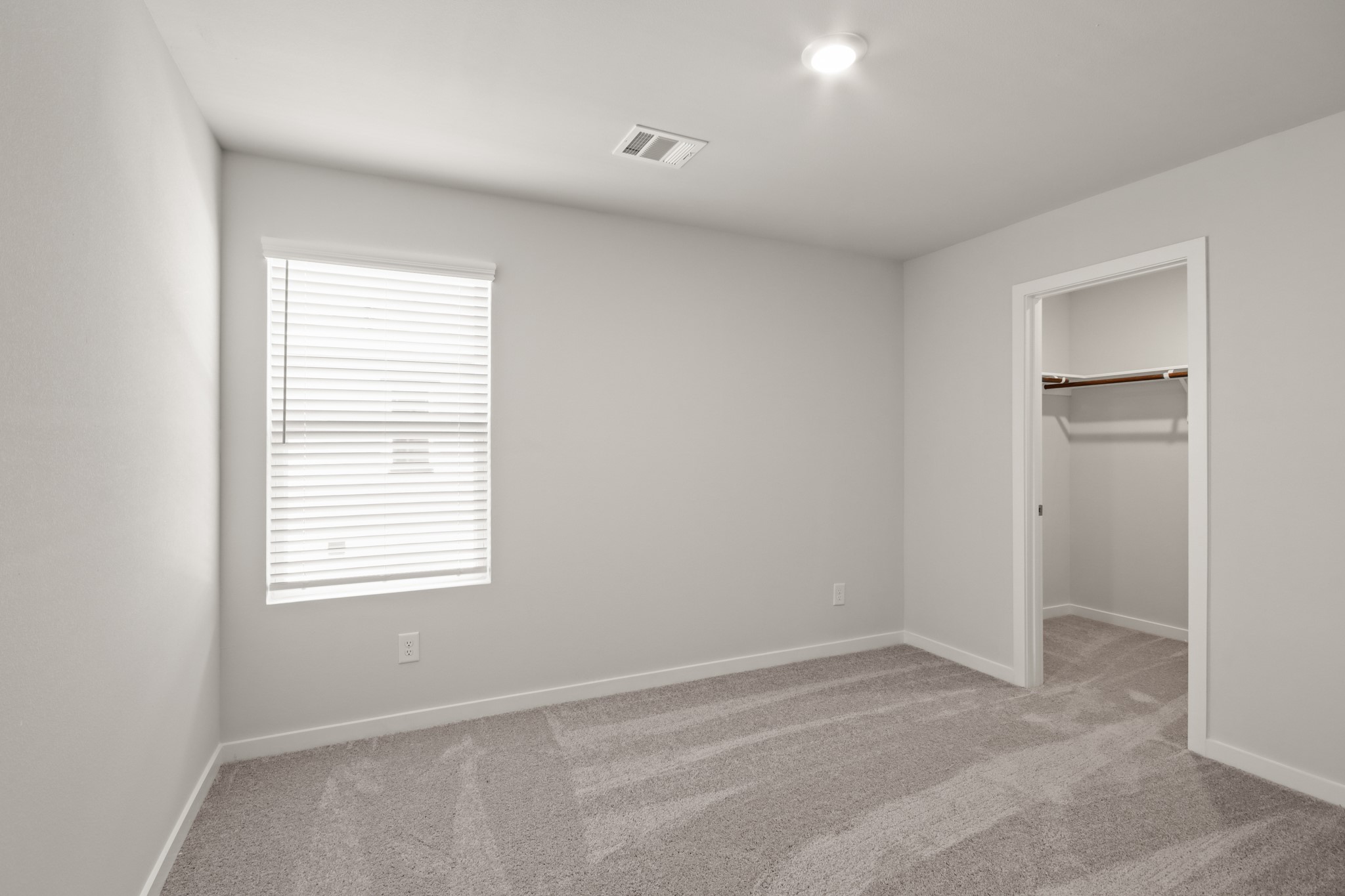 17203 King Eider Road Waller, TX 77484 - Photo 18 of 29 a view of an empty room with a window