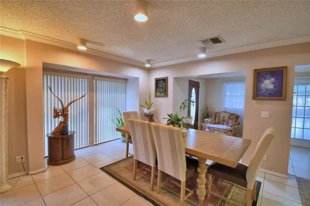 a kitchen with stainless steel appliances granite countertop wooden cabinets a sink and dishwasher