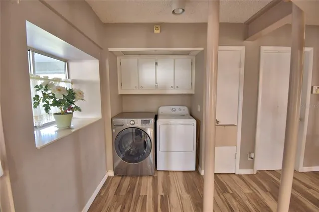 a bedroom with bed and window