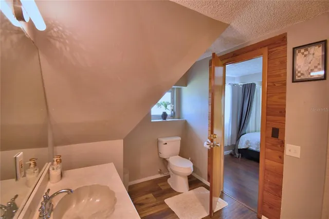 a living room with furniture rug and window