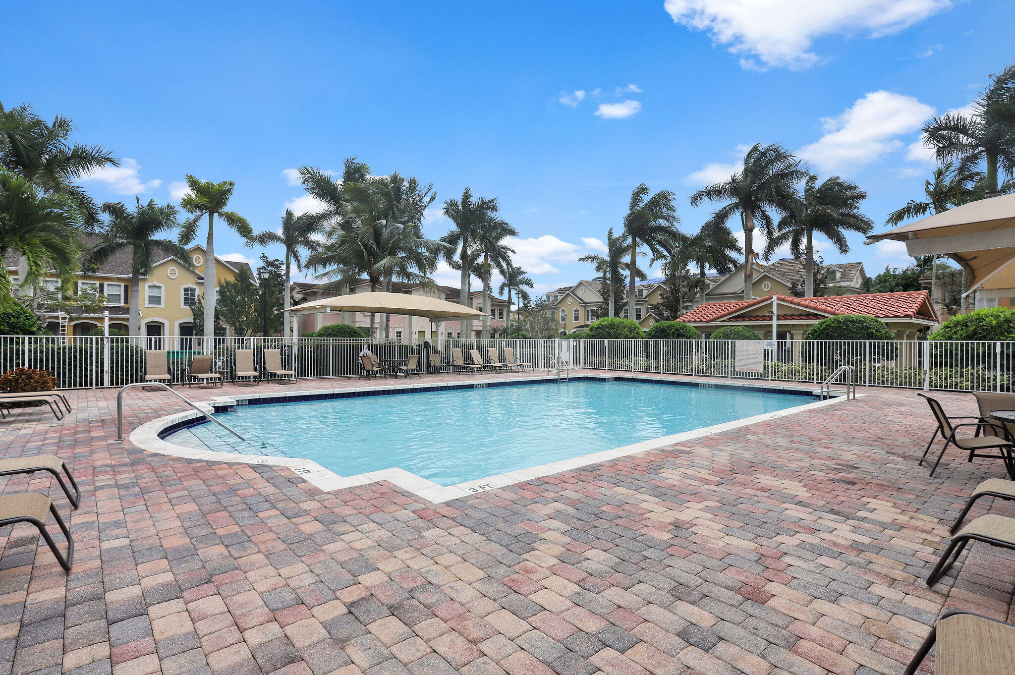 147 Killarney Court Jupiter, FL 33458 - Photo 58 of 68 Clubhouse heated pool