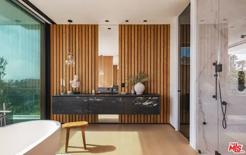 a bed room with furniture and a rug