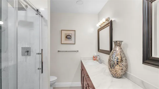 a very nice looking room with a large window and closet