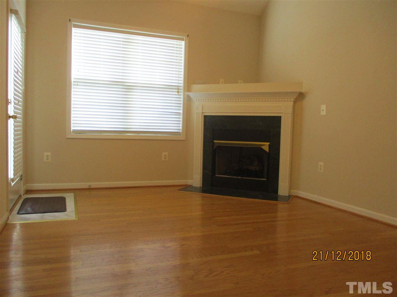 2822 Andover Glen Road Raleigh, NC 27604 - Photo 5 of 18 Great room with beautiful hardwood floors and fireplace