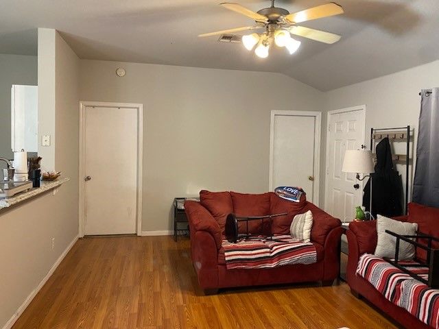 2303 North 12th Street Temple, TX 76501 - Photo 2 of 10 a living room with furniture and a flat screen tv
