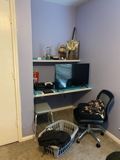 2303 North 12th Street Temple, TX 76501 - Photo 8 of 10 a room with a fireplace and cabinets