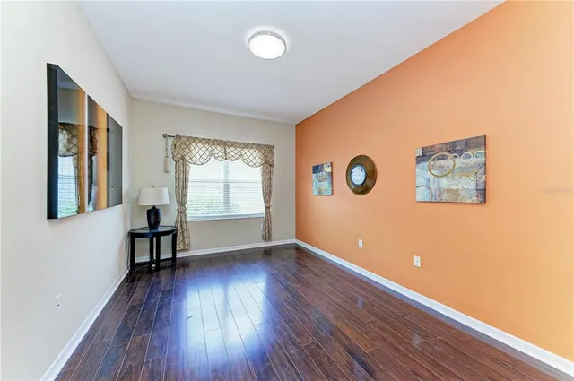 a view of livingroom with hardwood floor and window