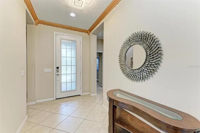 a room with a mirror and a glass door