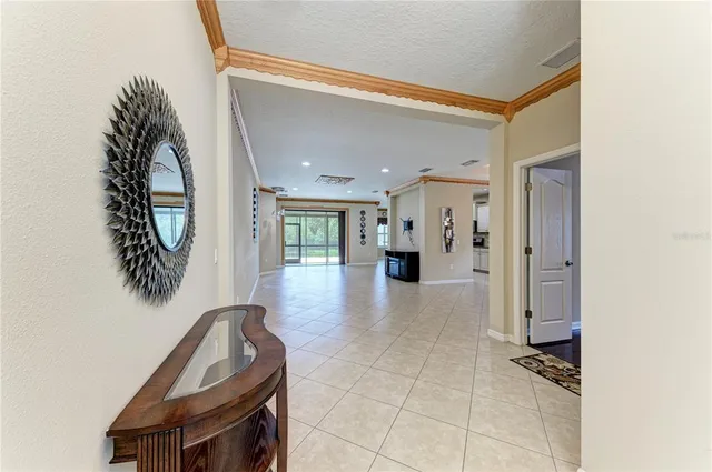 a view of livingroom with furniture and front door