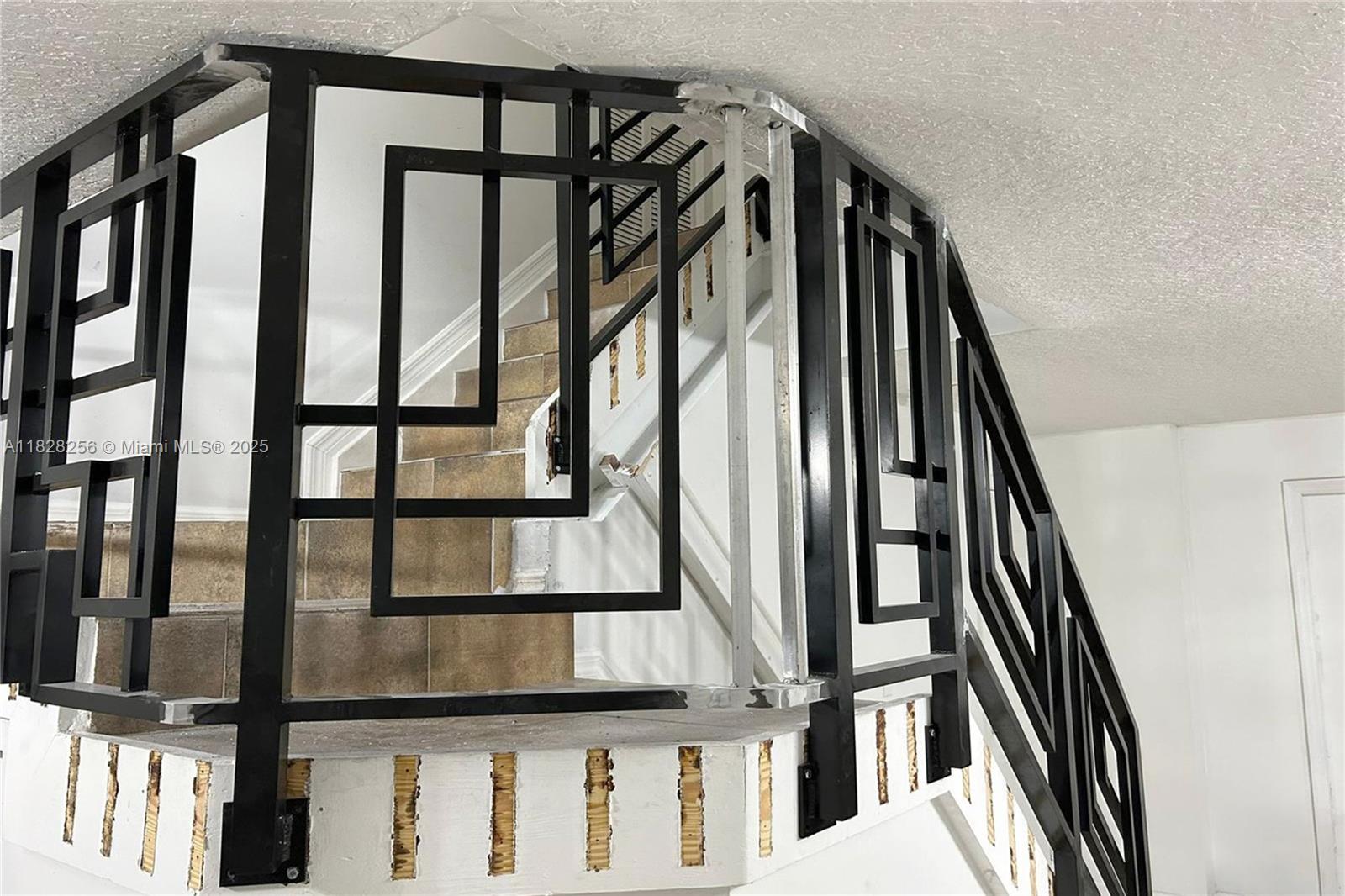 13990 Southwest 260th Street, Unit 101 Homestead, FL 33032 - Photo 23 of 34 a view of an entryway