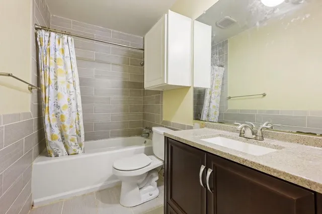 a view of a deck with wooden floor and outdoor space