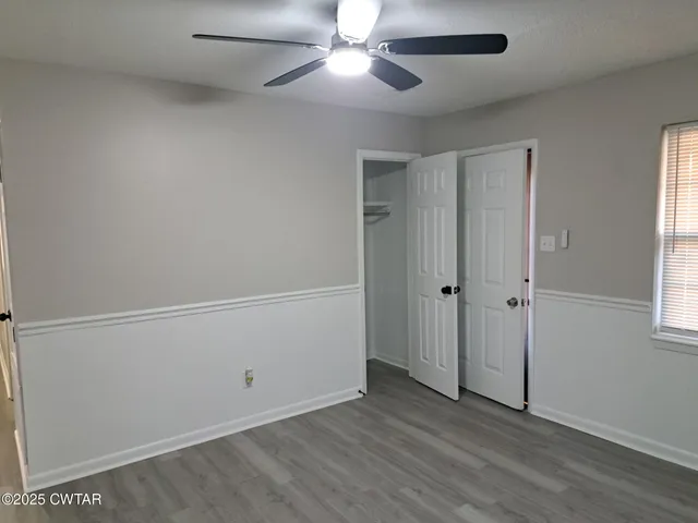 a view of an empty room and window