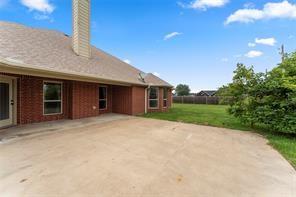 238 Rudder Road Gun Barrel City, TX 75156 - Photo 27 of 27 a front view of a house with a yard and garage