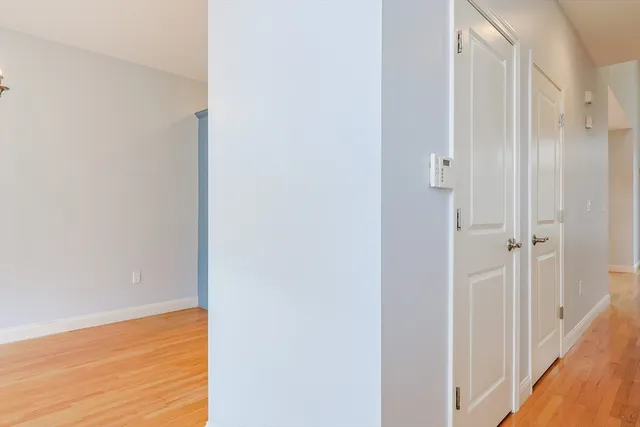 a view of a bathroom with wooden floor