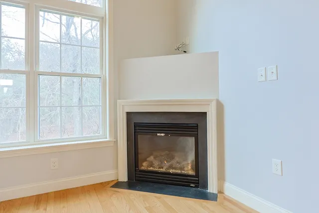 a living room with a fireplace