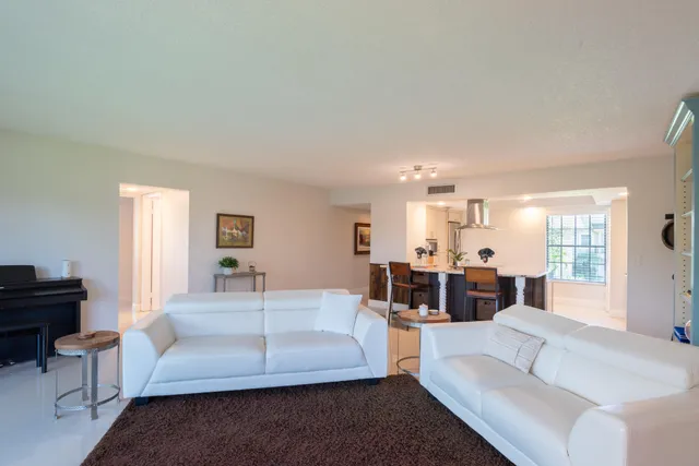 a view of a balcony with lake view and mountain view
