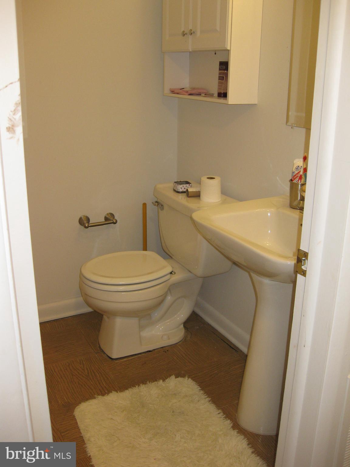 2316 Sugarcone Road Baltimore, MD 21209 - Photo 22 of 30 Basement 1/2 bath next to rec/play room and 5th BR