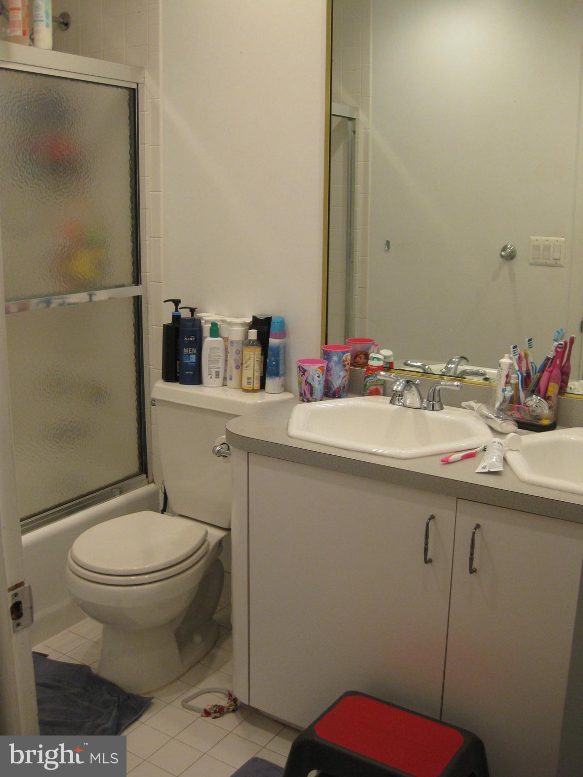 2316 Sugarcone Road Baltimore, MD 21209 - Photo 10 of 30 Full bath with tub a double vanity