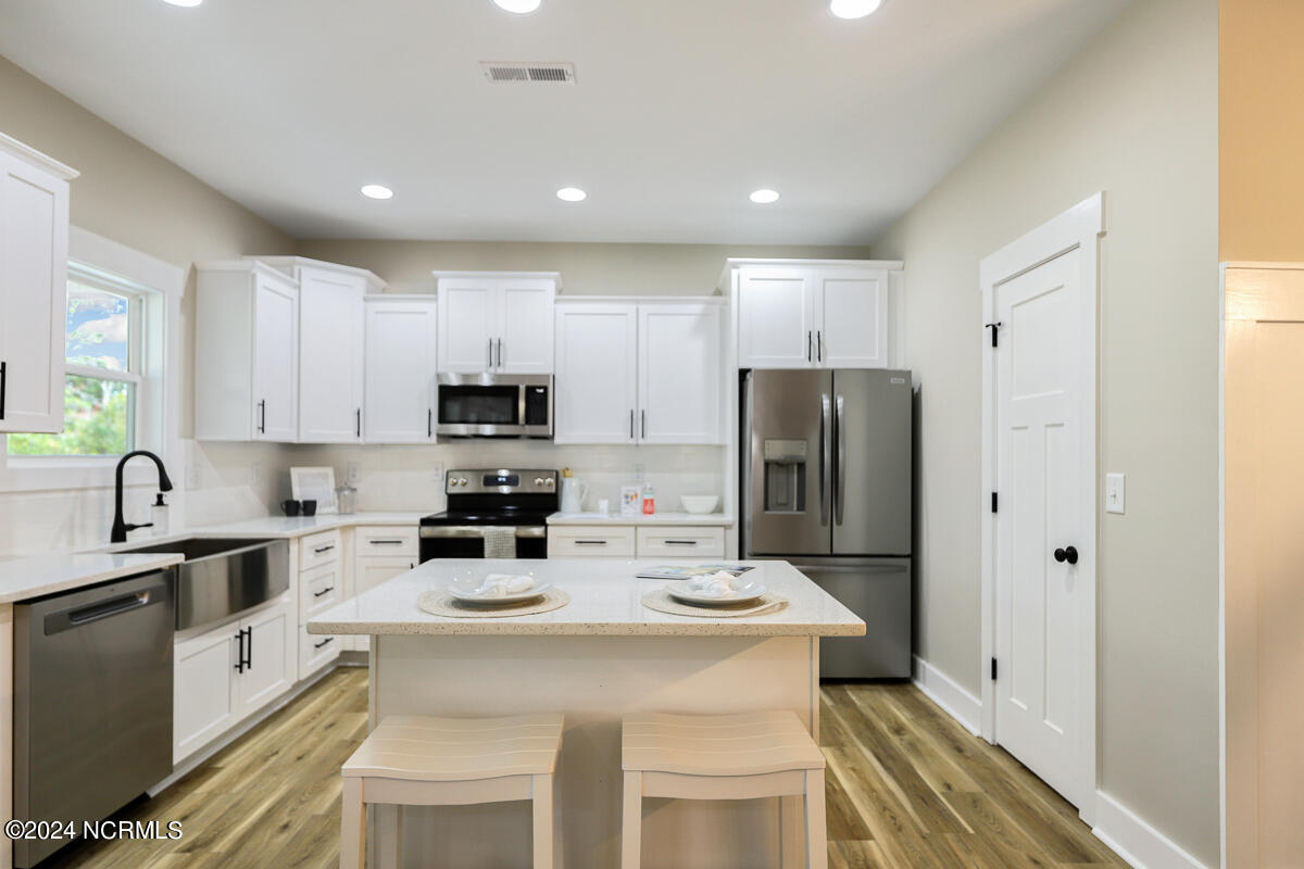 180 Boundary Loop Road Northwest Calabash, NC 28467 - Photo 5 of 22 Staged Kitchen