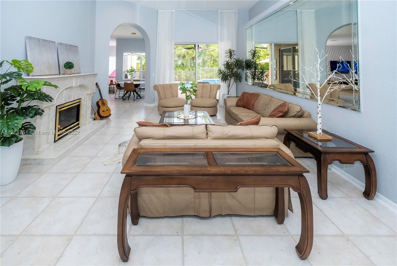 21432 Gosier Way Boca Raton, FL 33428 - Photo 31 of 55 a living room with furniture and a fireplace