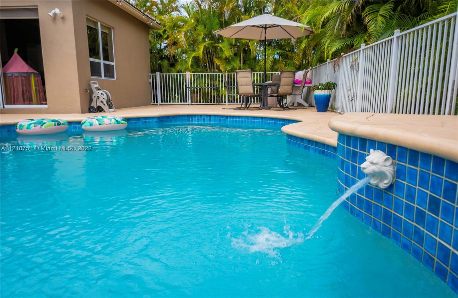 21432 Gosier Way Boca Raton, FL 33428 - Photo 45 of 55 a view of a house with backyard porch and sitting area