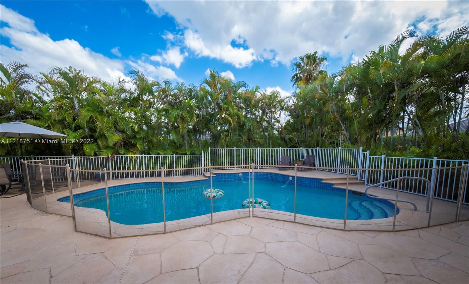 21432 Gosier Way Boca Raton, FL 33428 - Photo 47 of 55 a view of a swimming pool with a yard