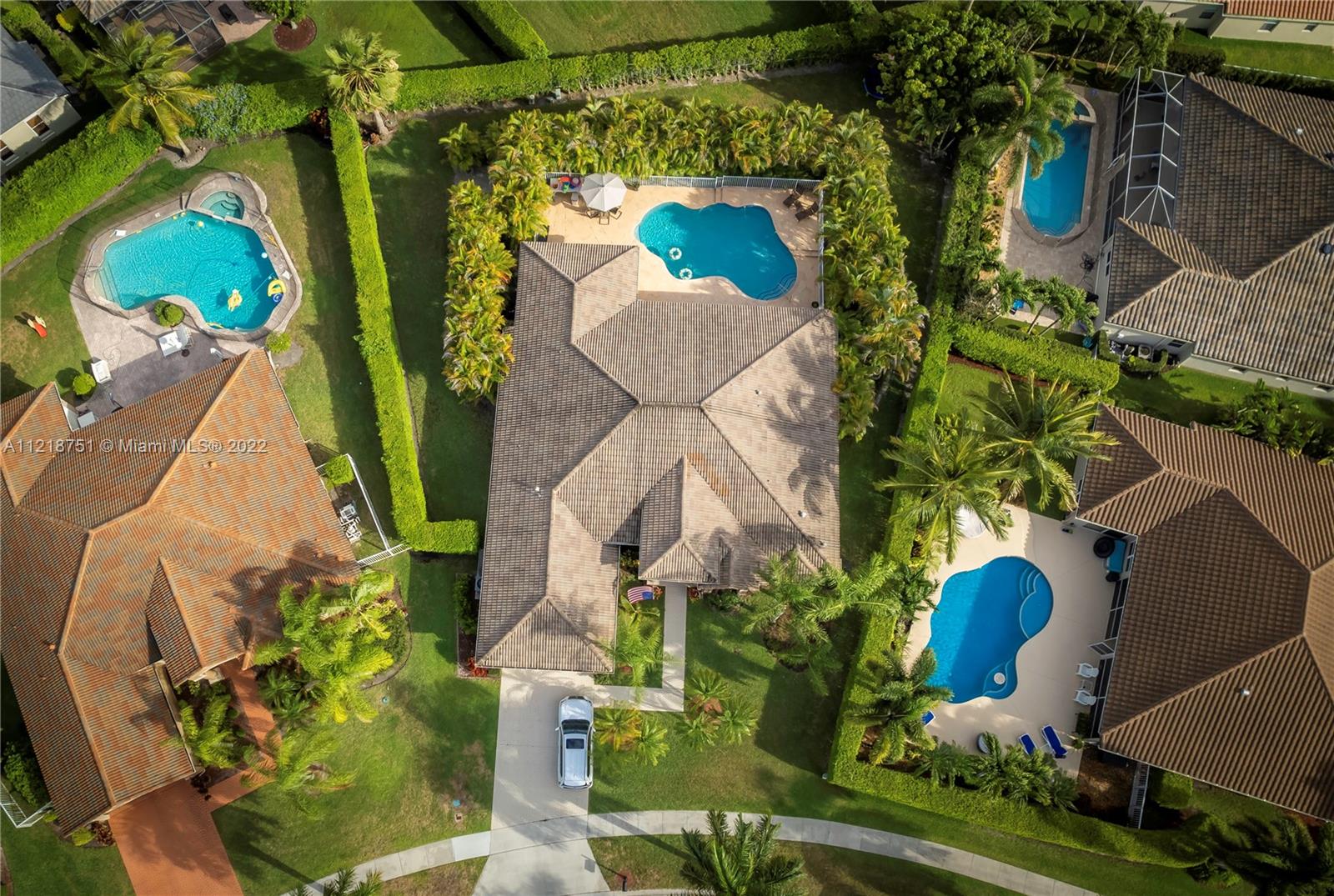 21432 Gosier Way Boca Raton, FL 33428 - Photo 54 of 55 an aerial view of a house with a yard and garden